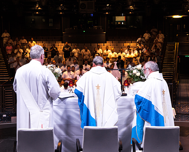 Bishop Joseph Kalathiparambil, Fr Bruno Ciceri and Rev Roger Stone from AoS celebrate Mass on board mv Britannia